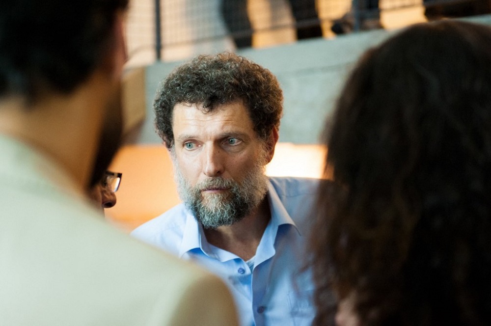 This undated handout photograph released on October 15, 2021, by the Anadolu Culture Centre shows Parisian-born Turkish philanthropist Osman Kavala speaking during an event in Istanbul. u00e2u20acu201d AFP pic