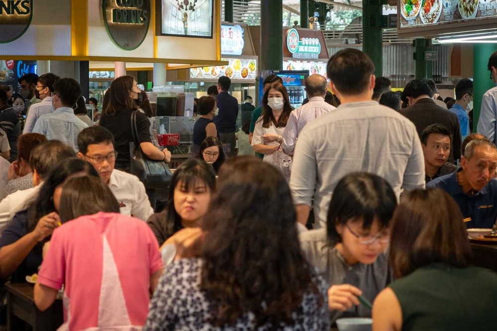 Officer workers at Lau Pa Sat food centre about noon on April 26, 2022. u00e2u20acu201d TODAY pic