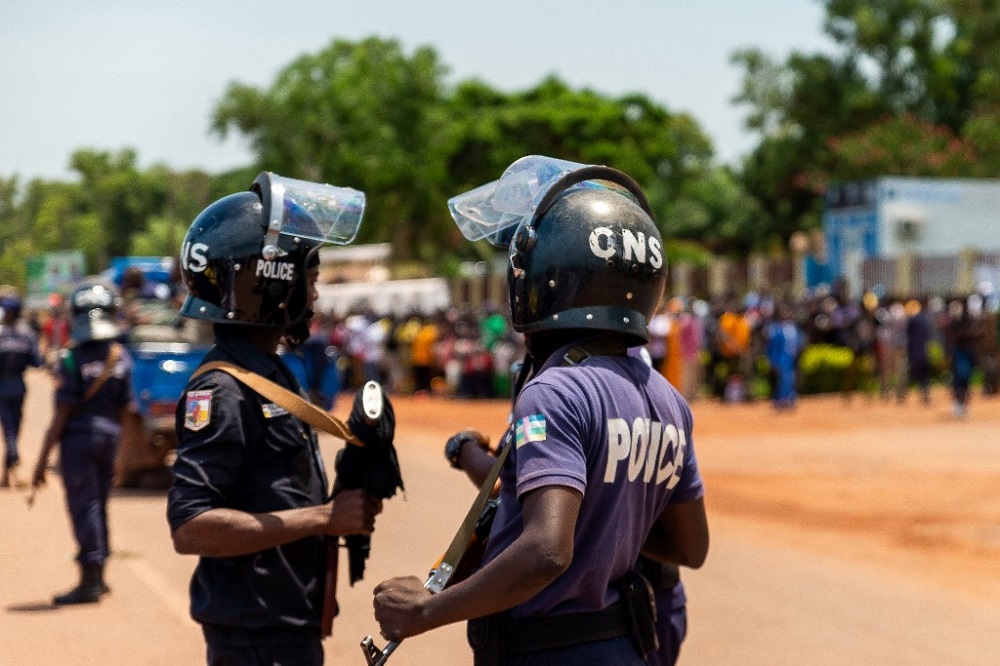 Riots police stand guard as supporters of Central African Republic President demonstrate to demand a change of the constitution in order to allow the president to run for a third term, in front of national assembly in Bangui April 29, 2022. u00e2u20acu201d AFP pic