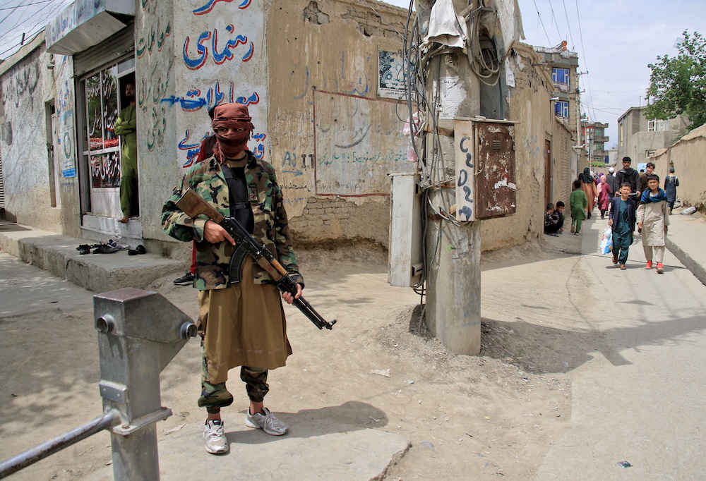 A Taliban fighter stands guard at the site of an explosion in Kabul, Afghanistan April 19, 2022. u00e2u20acu201d Reuters pic