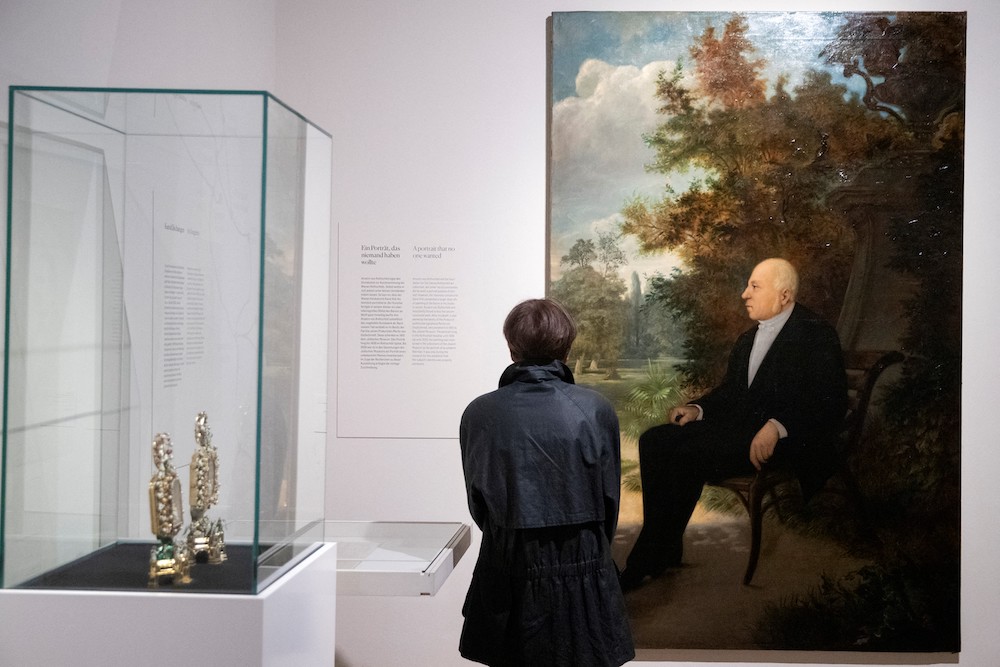 A visitor looks at a painting of Anselm von Rothschild by Czech painter Karel Klic displayed at the exhibition 'The Viennese Rothschilds - A Thriller' at the Jewish Museum in Vienna April 28, 2022. u00e2u20acu201d AFP pic 