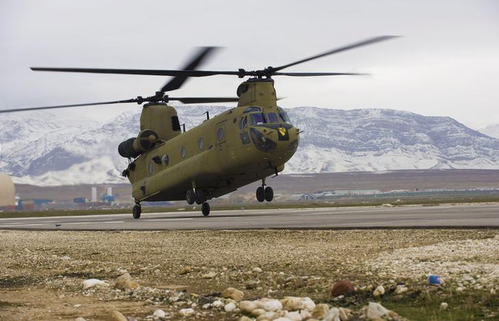 A CH-47F Chinook helicopter with 1st Air Calvary Brigade, lands at Camp Marmal, in Mazar-e Sharif province, Afghanistan, February 9, 2012. u00e2u20acu201d Reuters file pic