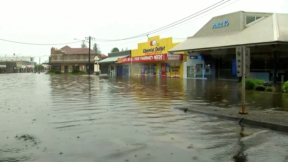 A view shows a flooded street following heavy rains in the town of Byron Bay, New South Wales, Australia March 30, 2022 in this still image taken from a video. u00e2u20acu2022 Australian Broadcasting Corporation/Handout via Reuters
