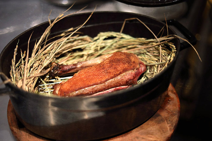 The rice smoked Challans duck before plating.