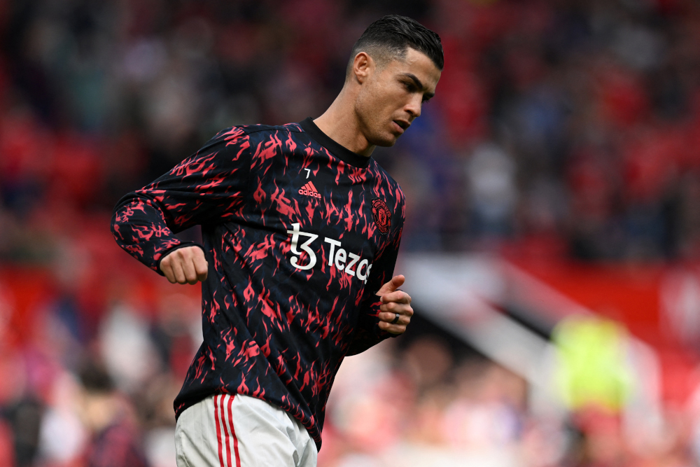 Manchester United striker Cristiano Ronaldo warms up ahead of the English Premier League match between Manchester United and Norwich City at Old Trafford in Manchester, April 16, 2022. u00e2u20acu201d AFP pic 