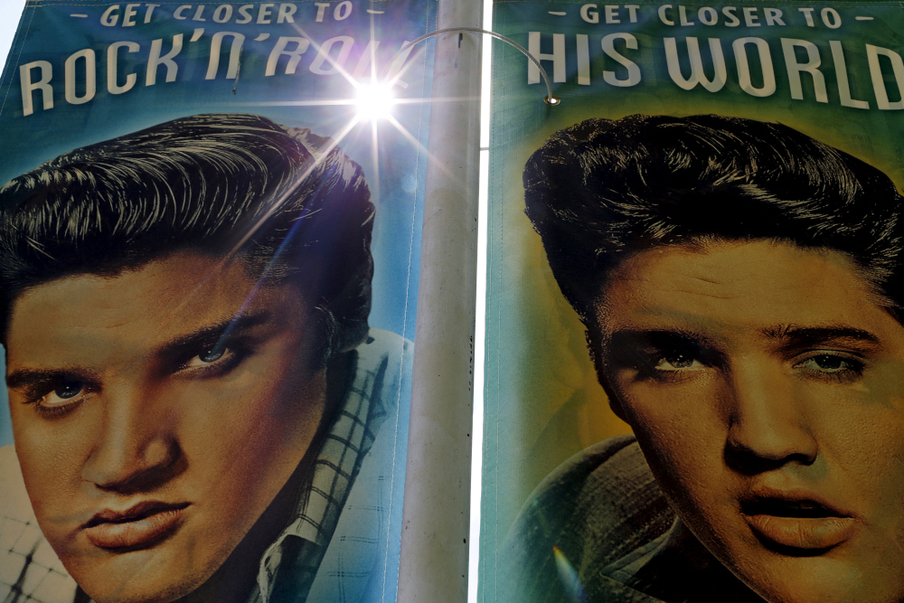 Street banners line Elvis Presley Boulevard near Graceland in Memphis, Tennessee, May 28, 2015. The estate that was home to Elvis Presley receives over 600,000 visitors a year and was declared a National Historic Monument in 2006. u00e2u20acu201d Reuters pic 