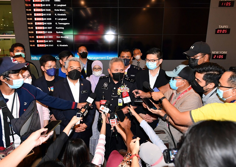 Bukit Aman Criminal Investigation Department director Datuk Seri Abd Jalil Hassan (centre) speaks to the press at the Kuala Lumpur International Airport 2 in Sepang April 12, 2022. u00e2u20acu201d Bernama pic