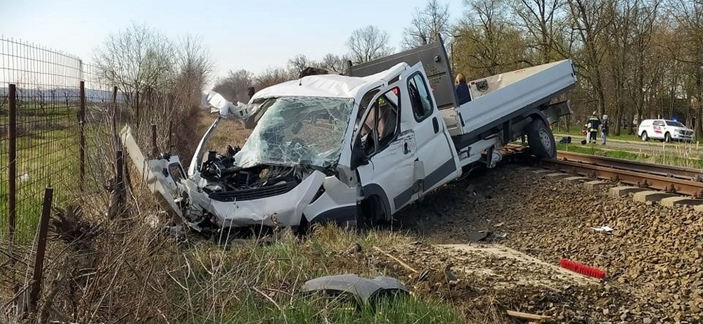 A damaged pick-up truck is seen at a scene of an accident where it crashed into a train in Mindszent, Hungary April 5, 2022. u00e2u20acu2022 Police.hu/Handout via Reuters