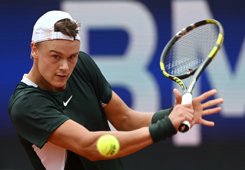 Denmarku00e2u20acu2122s Holger Rune returns the ball to Germanyu00e2u20acu2122s Alexander Zverev during their match of the ATP tennis BMW Open in Munich, southern Germany, April 27, 2022. u00e2u20acu201d AFP pic 
