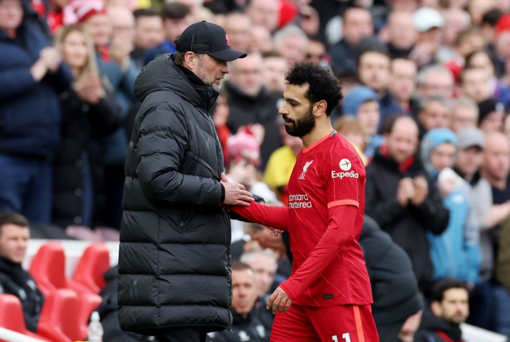 Liverpoolu00e2u20acu2122s Mohamed Salah with manager Jurgen Klopp after he was substituted during the Premier League match against Watford at Anfield, Liverpool, April 2, 2022. u00e2u20acu201d Reuters pic 