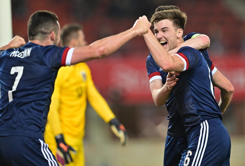 Scotlandu00e2u20acu2122s John McGinn and Kieran Tierney celebrate after scoring during the friendly match between Austria and Scotland at Ernst Happel stadium in Vienna, Austria, March 29, 2022. u00e2u20acu201d AFP pic 