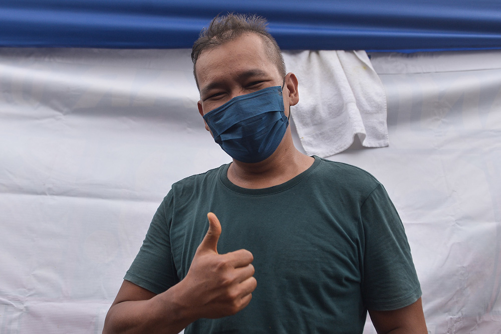 Ikan Bakar seller Suhaimi said he hopes customers understand the price hike is due to the increase in prices of ingredients and other materials used in preparing and packaging the food.