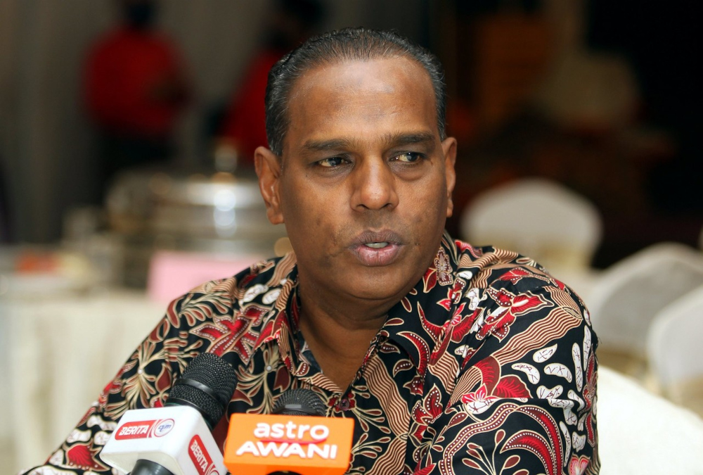 Human Resources Minister Datuk Seri M Saravanan speaks to the media after attending a buka puasa event in Tapah, Perak, April 28, 2022. u00e2u20acu201d Bernama pic 