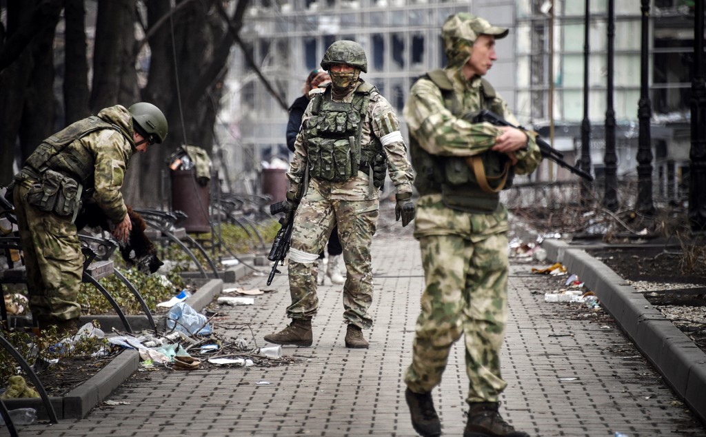 Russian soldiers walks along a street in Mariupol on April 12, 2022, as Russian troops intensify a campaign to take the strategic port city, part of an anticipated massive onslaught across eastern Ukraine. u00e2u20acu201d AFP pic