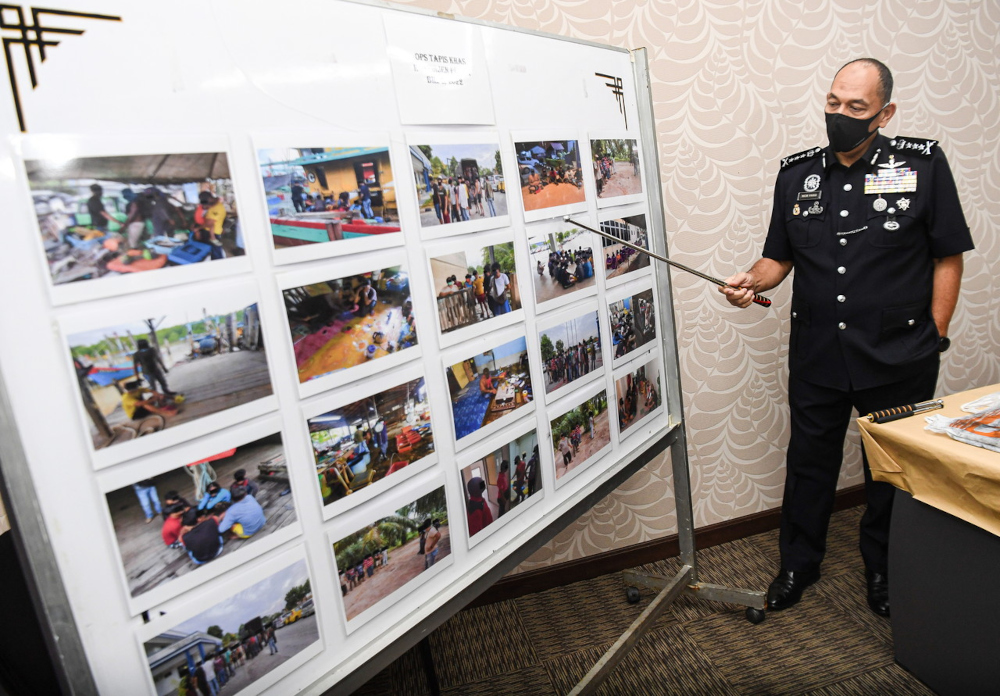 Perak police chief Datuk Mior Faridalathrash Wahid showing pictures of the drug raid in Bandar Seri Botani during a press conference at the Perak contingent police headquarters, April 22, 2022. u00e2u20acu201d Bernama picn
