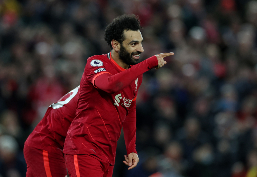 Liverpoolu00e2u20acu2122s Mohamed Salah celebrates scoring their fourth goal in the match against Manchester United at Anfield, Liverpool, April 19, 2022. u00e2u20acu201d Reuters pic 