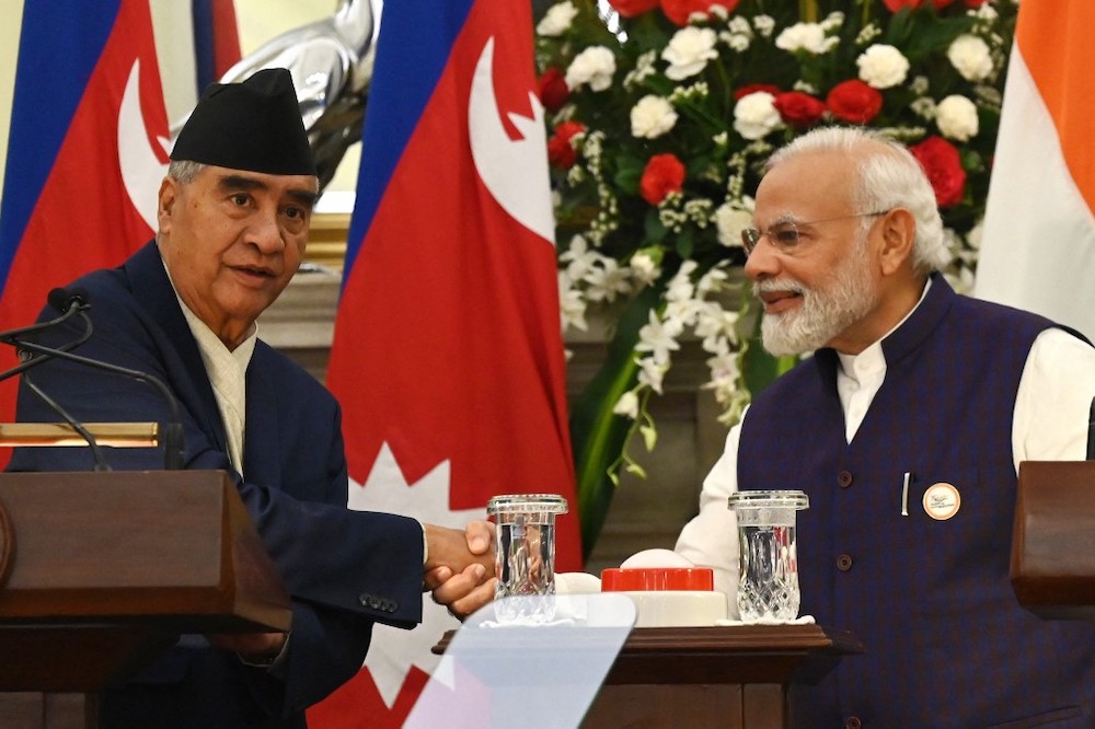 Nepalu00e2u20acu2122s Prime Minister Sher Bahadur Deuba (left) shakes hands with his Indian counterpart Narendra Modi during the exchange of agreements ceremony at the Hyderabad House in New Delhi on April 2, 2022. u00e2u20acu201d Reuters picnn