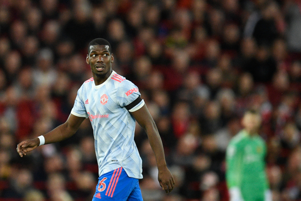 Manchester United midfielder Paul Pogba reacts during the English Premier League match against Liverpool at Anfield in Liverpool, north-west England, April 19, 2022. u00e2u20acu201d AFP picn