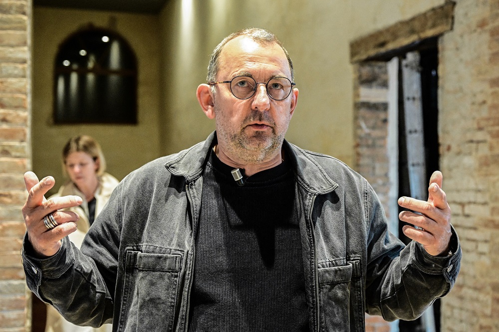 Ukrainian artist Pavlo Makov speaks at Ukraine's pavilion during a press day at the 59th Venice Art Biennale in Venice. u00e2u20acu2022 AFP pic