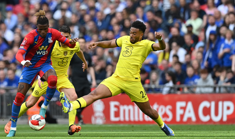 Crystal Palace striker Wilfried Zaha (left) is tackled by Chelsea defender Reece James during the English FA Cup semi-final match at Wembley Stadium in north west London, April 17, 2022. u00e2u20acu201d AFP pic 