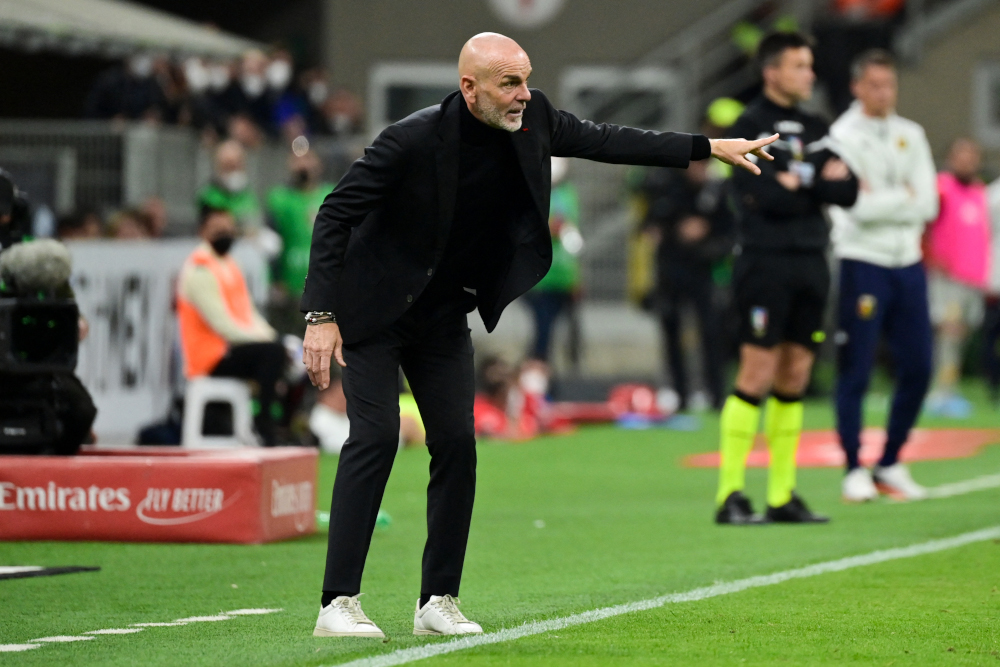 AC Milanu00e2u20acu2122s Italian head coach Stefano Pioli gestures during the Italian Serie A football match between AC Milan and Genoa at the Giuseppe Meazza Stadium in Milan, April 15, 2022. u00e2u20acu201d AFP pic 