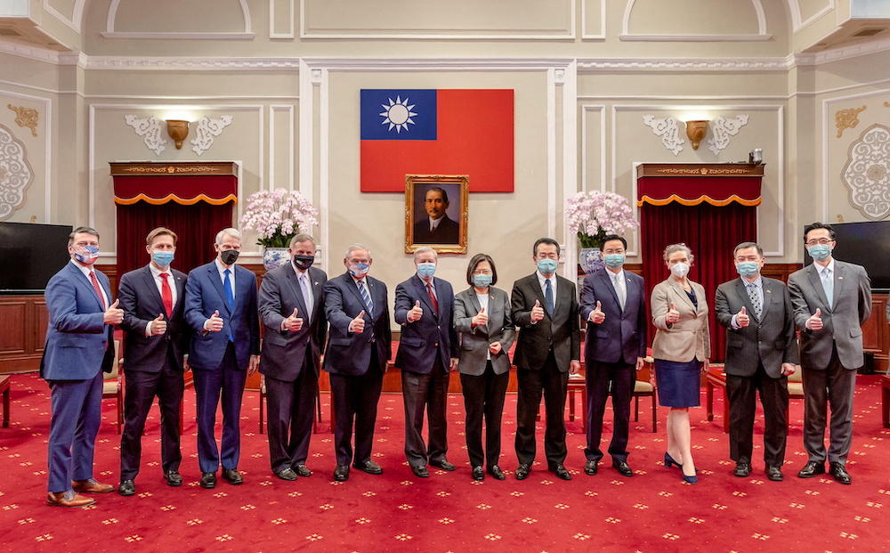 Taiwan President Tsai Ing-wen poses for a group photograph with US Senator Lindsey Graham, Bob Menendez, chairman of the US Senate Foreign Relations Committee, and other US delegation members, at the presidential office in Taipei, Taiwan, in this handout 