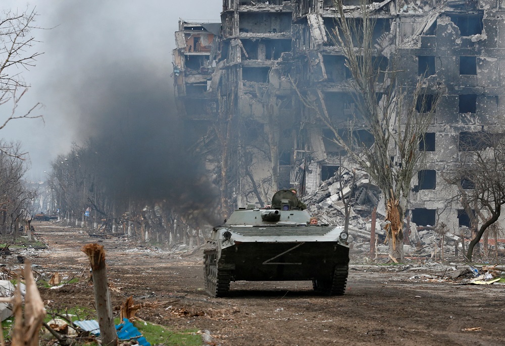 Service members of pro-Russian troops ride an armoured vehicle during fighting in Ukraine-Russia conflict near a plant of Azovstal Iron and Steel Works company in the southern port city of Mariupol, Ukraine April 12, 2022. u00e2u20acu2022 Reuters pic