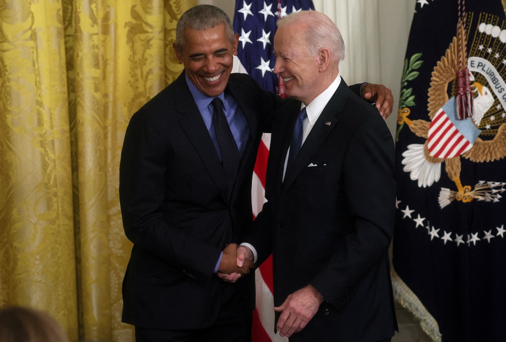 US President Joe Biden and former US President Barack Obama embrace after they spoke about the Affordable Care Act and Medicaid at the White House in Washington April 5, 2022. u00e2u20acu2022 Reuters pic