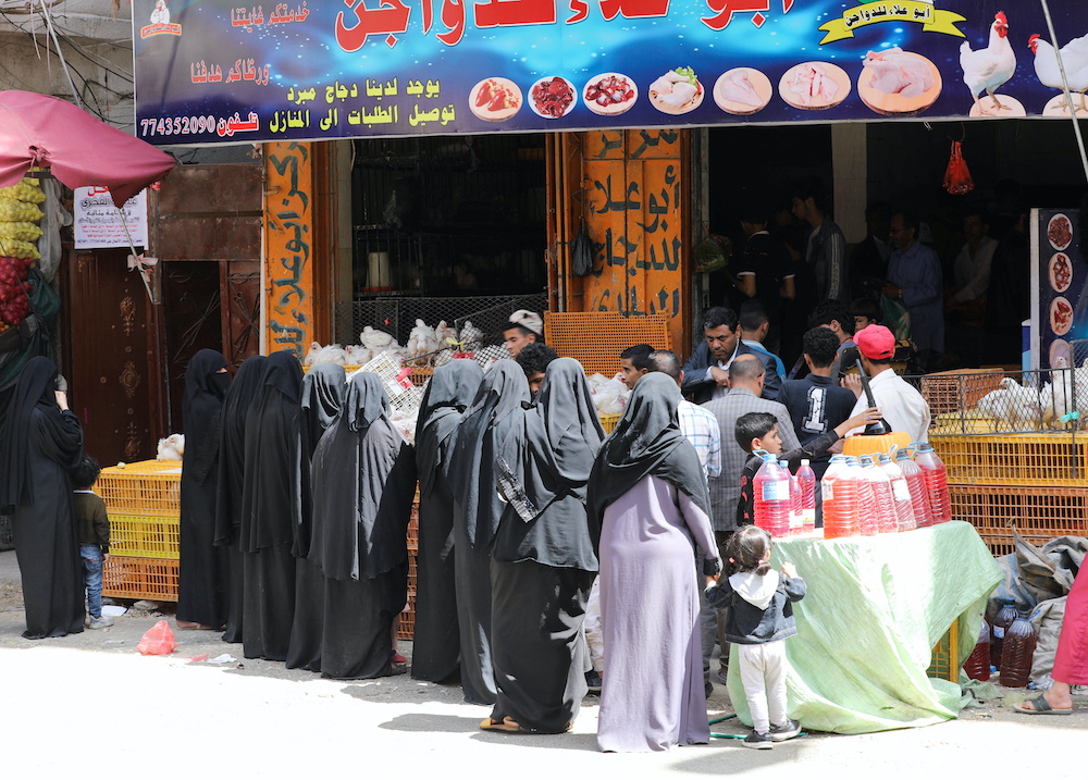 Women gather outside a kitchen butchery hours before a two-month nationwide truce takes effect, in Sanaa, Yemen April 2, 2022. u00e2u20acu201d Reuters pic