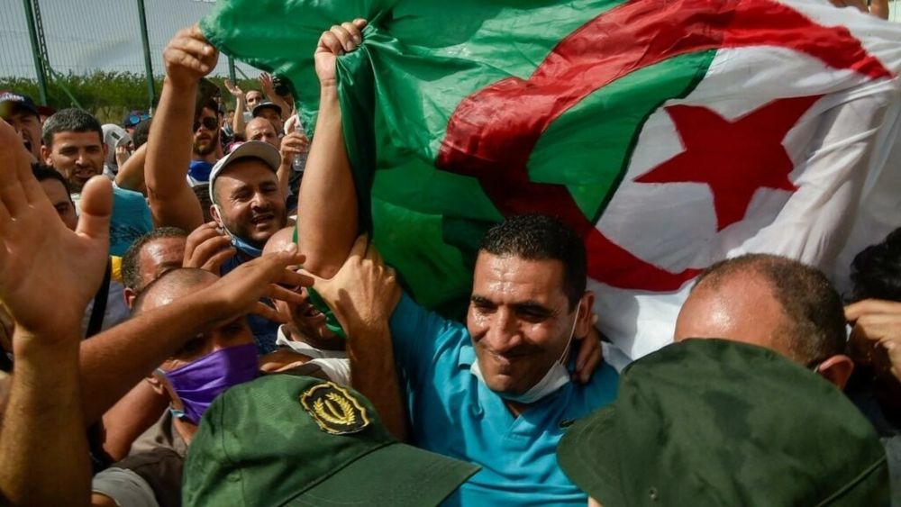 File picture shows Karim Tabbou being greeted upon his release from prison on July 2, 2020, near the city of Tipasa, west of the capital Algiers. u00e2u20acu201d AFP pic