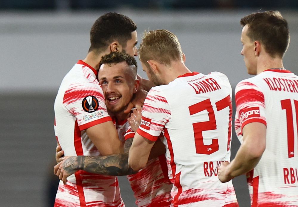 RB Leipzig's Angelino celebrates scoring their first goal against Rangers with teammates at the Red Bull Arena, Leipzig April 28, 2022. u00e2u20acu201d Reuters pic