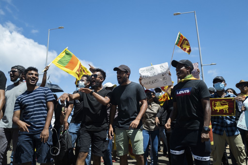 People shout slogans during an ongoing anti-government demonstration near the presidentu00e2u20acu2122s office in Colombo on April 16, 2022, demanding President Gotabaya Rajapaksau00e2u20acu2122s resignation over the countryu00e2u20acu2122s crippling economic crisis. u00e2u20acu201d AFP pic