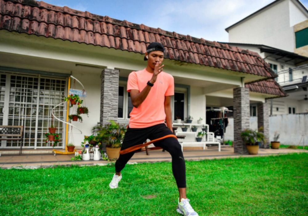 Muhammad Azeem Mohd Fahmi undergoing physical training when met at his residence in Kampung Durian Sebatang, Teluk Intan, June 3, 2021. u00e2u20acu201d Bernama pic