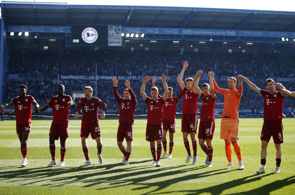 Bayern Munich players celebrate after the match against Arminia Bielefeld at Bielefelder Alm, Bielefeld April 17, 2022. u00e2u20acu201d Reuters pic
