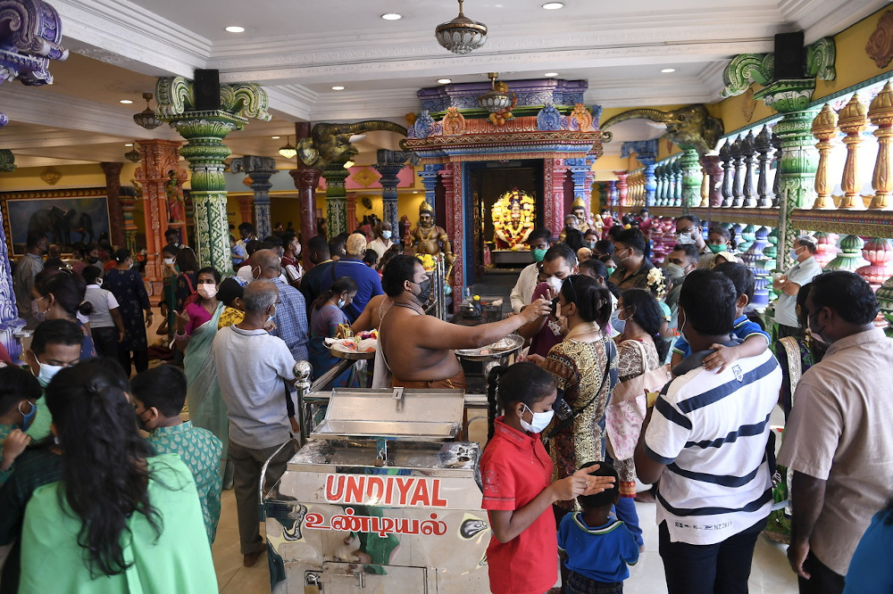 Hindu devotees visit the Sri Subramaniar Swamy Temple in Batu Caves, to perform prayers with further relaxation of the standard operating procedures (SOP) April 3, 2022. u00e2u20acu201d Bernama pic