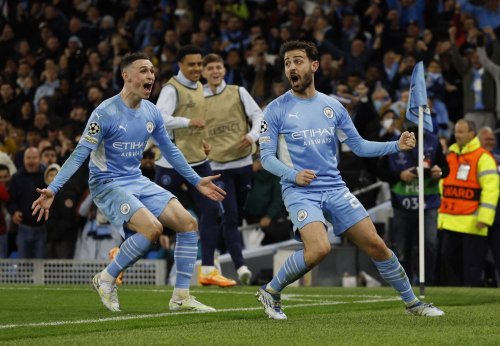 Manchester City's Bernardo Silva (right) celebrates scoring their fourth goal against Real Madrid with Phil Foden at the Etihad Stadium, Manchester April 26, 2022. u00e2u20acu201d Reuters pic