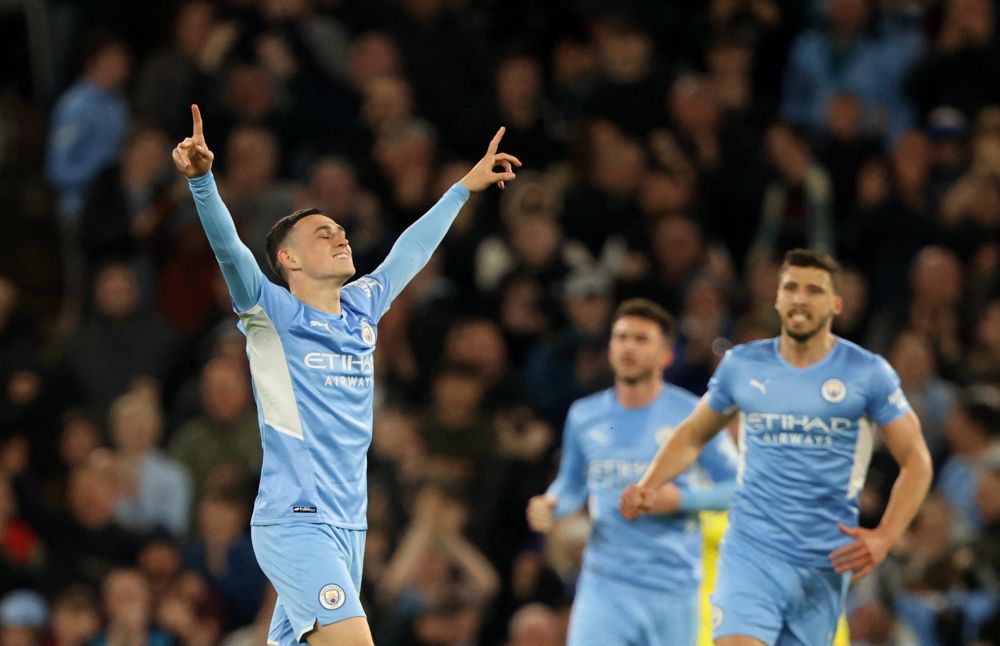 Manchester City's Phil Foden celebrates scoring their second goal against Brighton at the Etihad Stadium, Manchester April 20, 2022. u00e2u20acu2022 Reuters pic