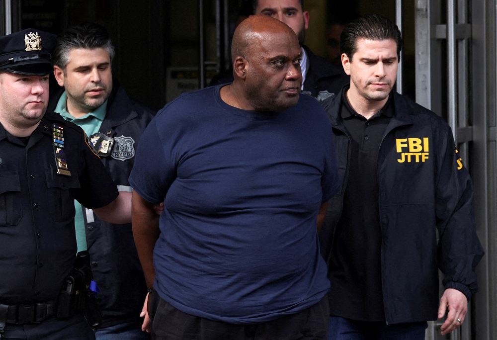 Frank James, the suspect in the Brooklyn subway shooting walks outside a police precinct in New York April 13, 2022. u00e2u20acu2022 Reuters pic