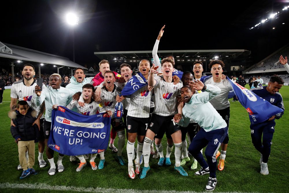 Fulham players celebrate after being promoted to the Premier League after the match against Preston North End at Craven Cottage, London April 19, 2022. u00e2u20acu201d Reuters pic