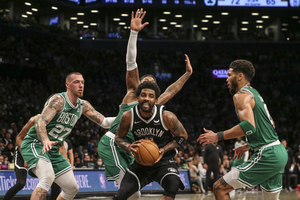 Brooklyn Nets guard Kyrie Irving (11) is triple teamed by Boston Celtics players at the Barclays Centre in Brooklyn April 23, 2022. u00e2u20acu201d Reuters picnn