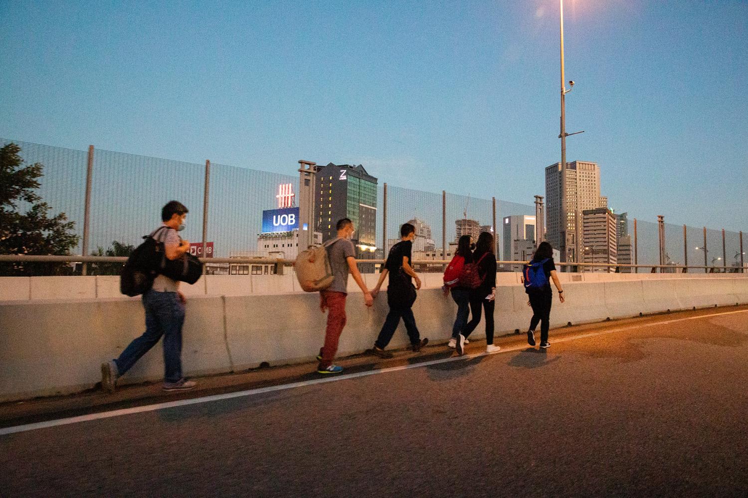 People walking to Malaysia from Woodlands Checkpoint on April 1, 2022. u00e2u20acu201d TODAY pic