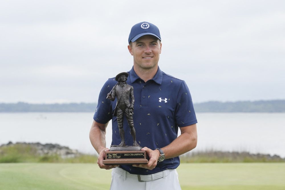 Jordan Spieth holds the champions trophy after winning the RBC Heritage golf tournament in South Carolina April 17, 2022. u00e2u20acu201d Reuters picnn