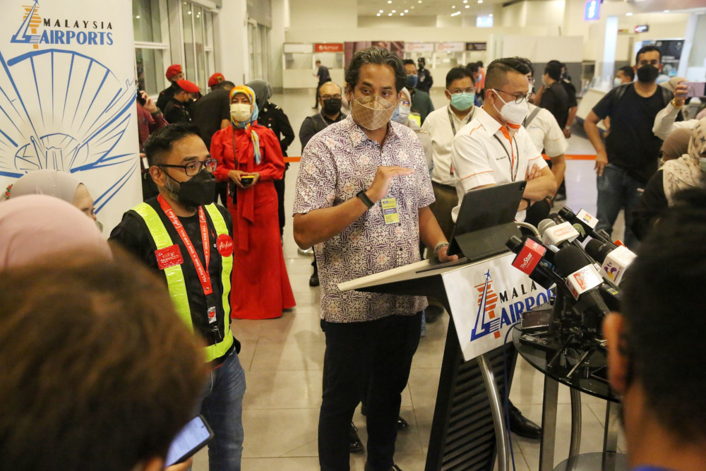 Health Minister Khairy Jamaluddin gives a press conference at the arrival hall of KLIA2 during the first day of Malaysiau00e2u20acu2122s border opening, April 1, 2022. u00e2u20acu201d Picture by Choo Choy May