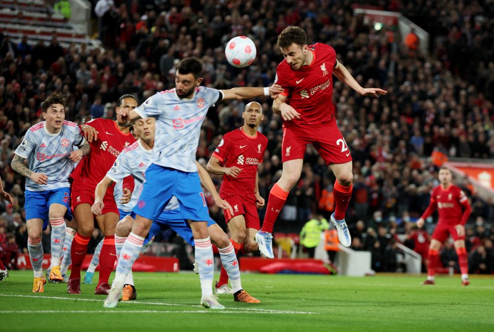 Liverpool's Diogo Jota in action with Manchester United's Bruno Fernandes at Anfield, Liverpool April 19, 2022. u00e2u20acu201d Reuters pic