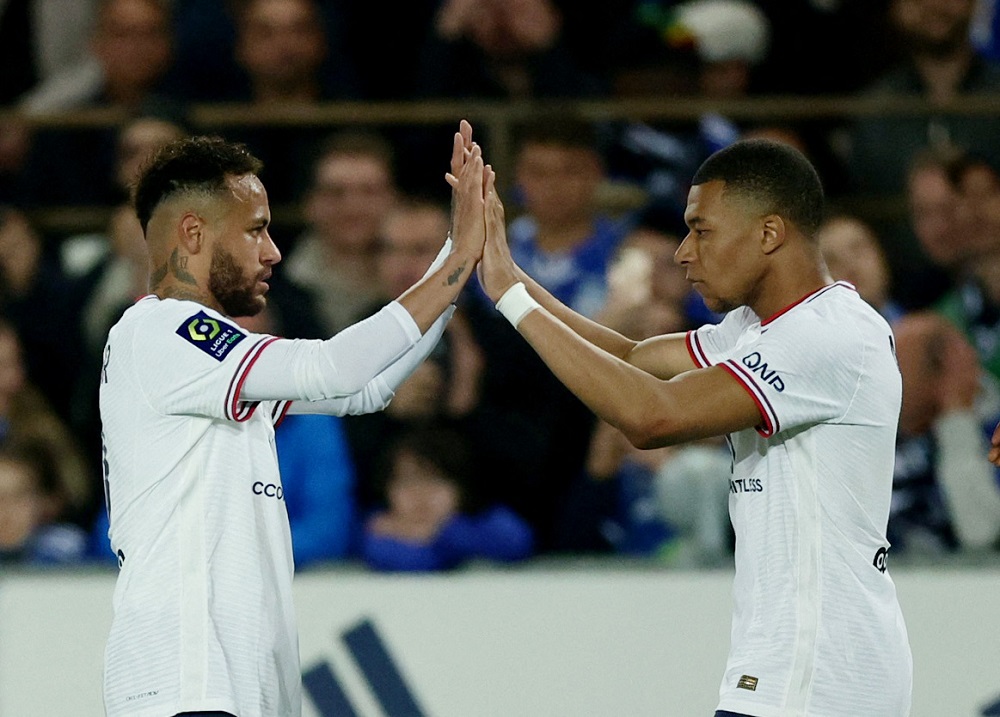 Paris St Germain's Kylian Mbappe celebrates with Neymar after scoring the third goal against RC Strasbourg April 30, 2022. u00e2u20acu2022 Reuters pic 