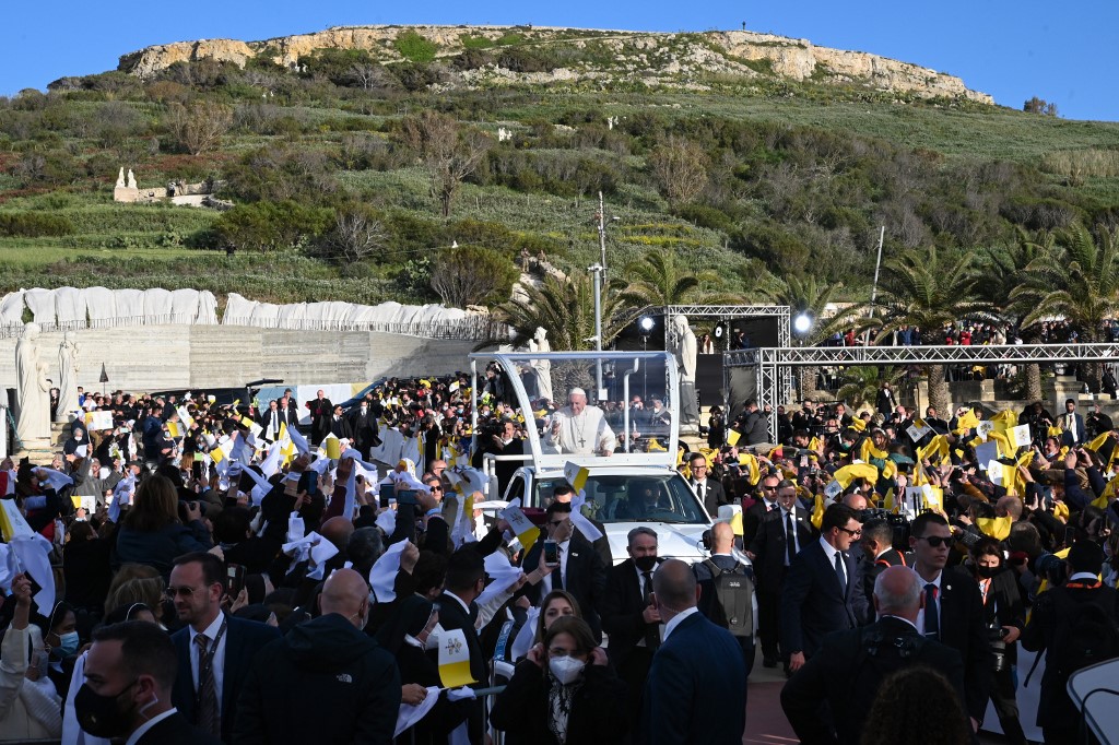 Pope Francis (centre) blesses attendees as he arrives in the popemobile car for a meeting of prayer outside the Basilica of the National Shrine of the Blessed Virgin of Ta' Pinu, in Gharb, Gozo island, Malta, April 02, 2022. u00e2u20acu201d AFP pic