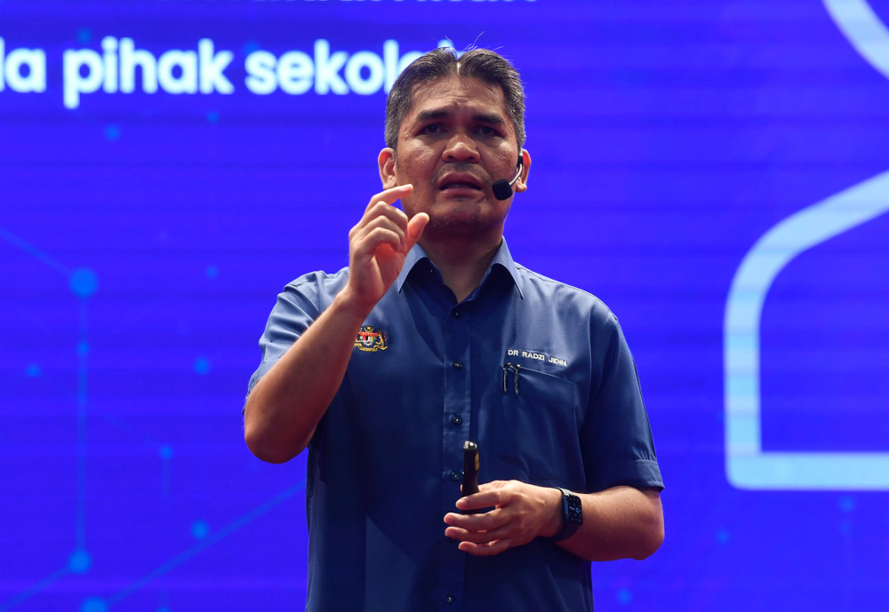 Senior Education Minister Datuk Mohd Radzi Md Jidin speaks at a press conference at the Complex E Auditorium in Putrajaya, April 28, 2022. u00e2u20acu201d Bernama pic 