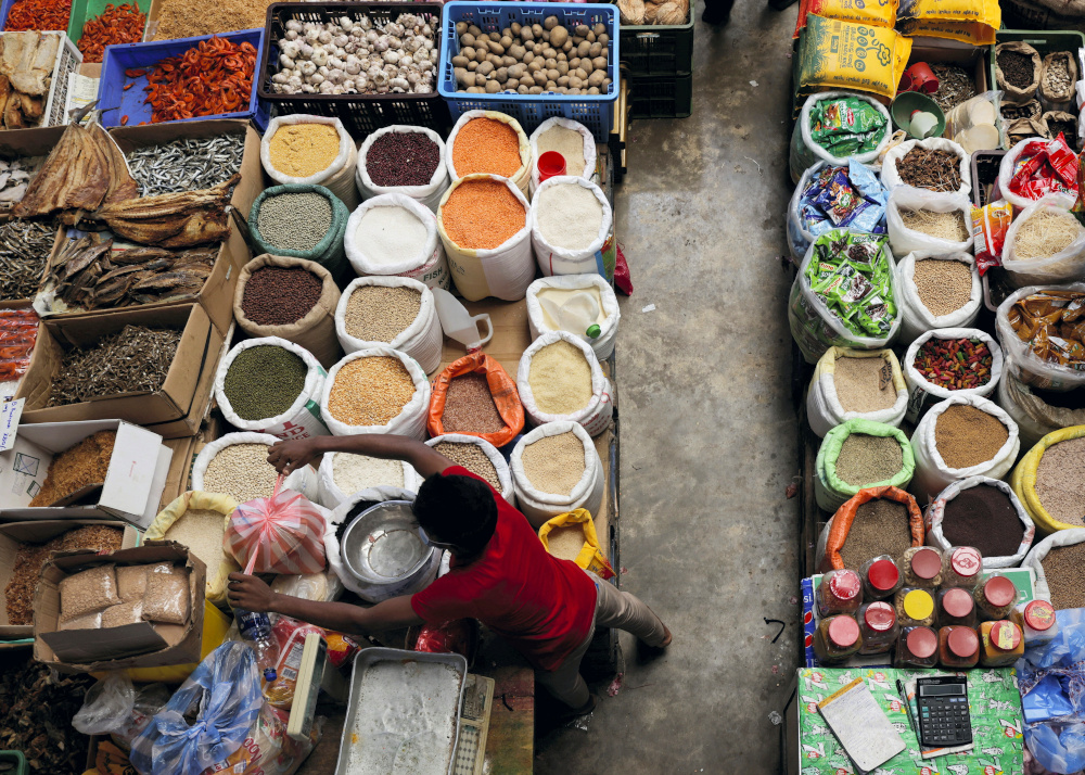 A vendor prepares a bag for a customer at a wholesale market, amid the countryu00e2u20acu2122s economic crisis in Colombo April 13, 2022. u00e2u20acu201d Reuters pic