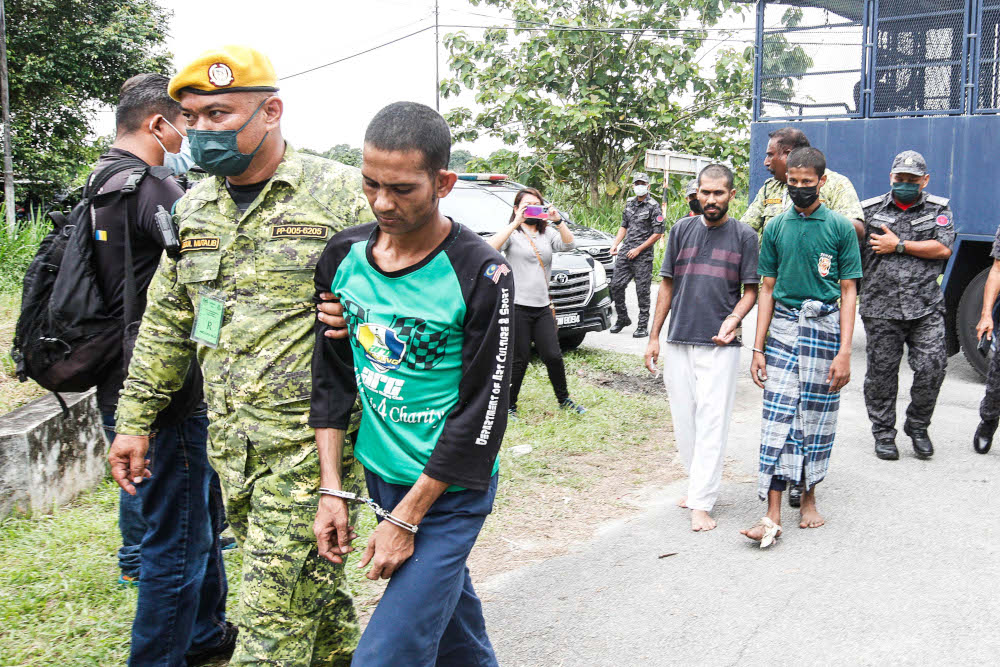 Rohingya detainees who fled the compound are brought back to Sri Impian Temporary Immigration Detention Centre, Bandar Baharu, Kedah, April 20, 2022. u00e2u20acu201d Picture by Sayuti Zainudin
