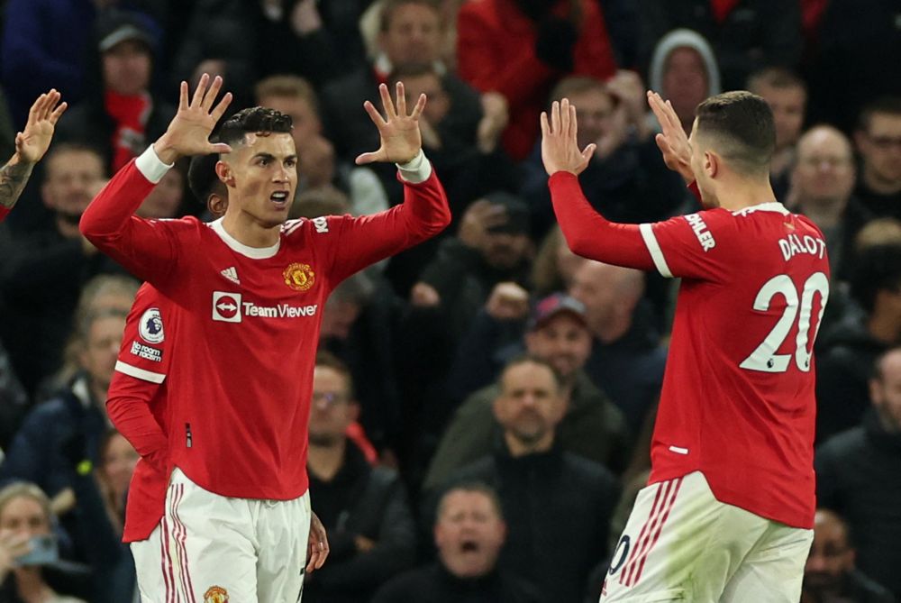 Manchester United's Cristiano Ronaldo celebrates scoring their first goal against Chelsea with Diogo Dalot at Old Trafford, Manchester April 28, 2022. u00e2u20acu201d Reuters pic